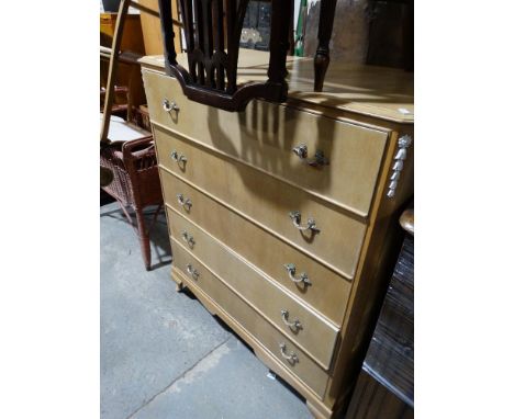     A Light Wood Finish Five Drawer Bedroom Chest                                   