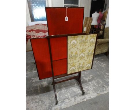     An Edwardian Mahogany Adjustable Fire Screen With Pull Out Panels               
