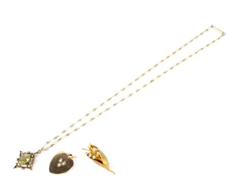 Three early 20th century jewels and a necklace. Comprising; a gold and small half-pearl trefoil heart-shaped locket, the bale