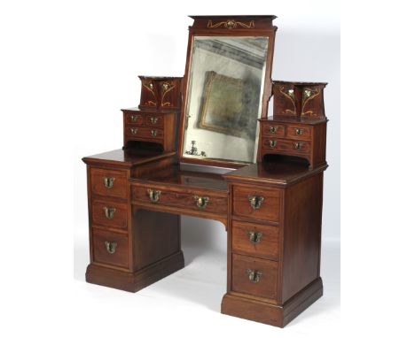 A fine Art Nouveau mahogany twin pedestal swing mirror dressing table. The swing mirror inlaid with mother of pearl, brass an
