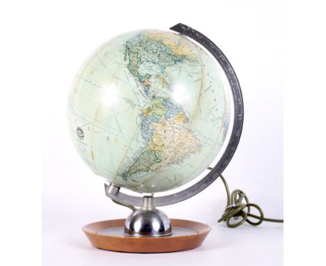 A 1960s German (JRO Globus) electrified table top globe. On chrome bracket and wooden base, printed JRO marks to globe, 33cm 