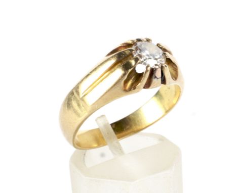 An early to mid-20th century gold and diamond single stone gypsy ring. The round brilliant approx. 0.55cts, claw set to a tap