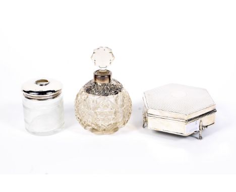 Three assorted ladies silver dressing table accessories, including  a scent bottle, hair grip lidded jar and  a hexagon shape