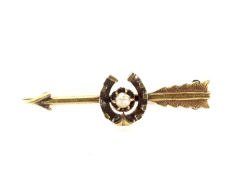 A late Victorian gold and half-pearl brooch. In the form of a 'lucky' horseshoe centred with a small half-pearl and an arrow,
