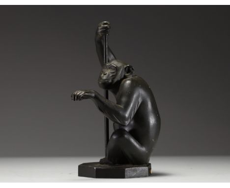 Max LE VERRIER (1891-1973) â€˜Monkey with umbrellaâ€™ Cast-iron lamp with black patina, signed. This model is listed under no