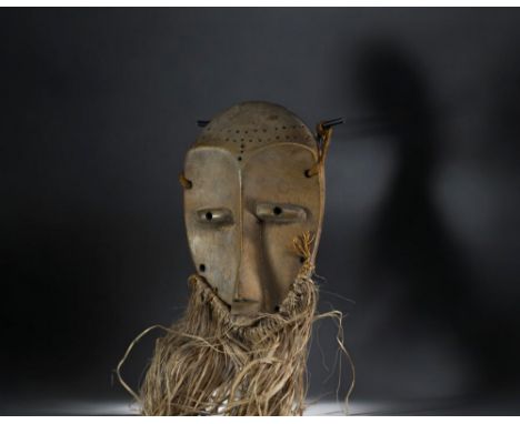 Africa DRC - Lega mask in carved wood and raffia. tribal patina Provenance :Â&nbsp; Collected before 1955 by Andre Simoens, a