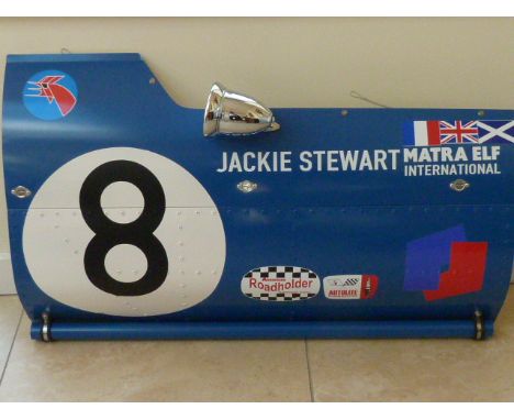 A modern replication of a Matra Elf MS10 F1 car side panel complete with all sponsorship logos and racing number, Sir Jackie 