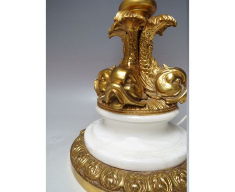 A MID 20TH CENTURY CONTINENTAL GILT BRASS AND RECONSTITUTED MARBLE TABLE LAMP, central column supported by four mythological 