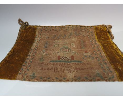 AN EARLY 19TH CENTURY SAMPLER SET WITHIN A PILLOW COVER, 'Ann Featherstone,s Work Aged 13 Years March th 21 1822', overall W 