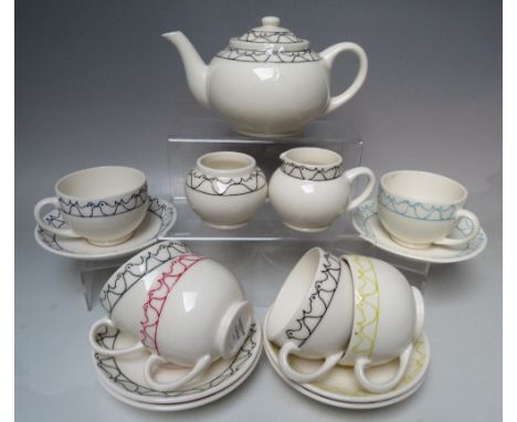 A MOORCROFT POTTERY TRIAL DESIGN 'BIRD' PATTERN TEASET, cream ground with tubelined decorative border, comprising tea pot, mi