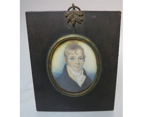 (XIX). An oval portrait miniature study on ivory of a Georgian gentleman with black coat and white cravat, unsigned,. framed 