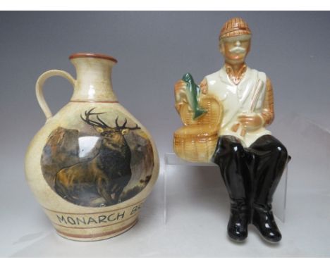 VINTAGE 1969 BALLANTINES LIQUOR PORCELAIN DECANTER IN THE FORM OF A SEATED FISHERMAN, together with a Monarch Brand Scotch Wh