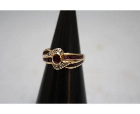 AN 18 CARAT GOLD RUBY AND DIAMOND RING, approx weight 6.8g, ring size P