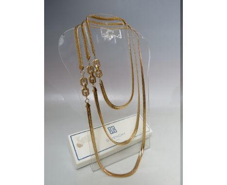 A SET OF THREE VINTAGE GIVENCHY  GOLDTONE HERRINGBONE &amp; LOGO NECKLACES, each stamped to the reverse of the logo clasp, ap