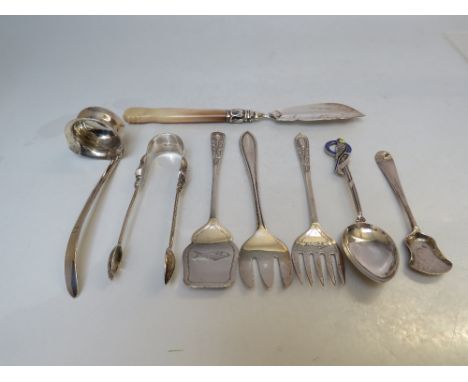 A COLLECTION OF HALLMARKED SILVER FLATWARE, various dates and makers, to include a pair of Queen Victoria sugar tongs, and a 