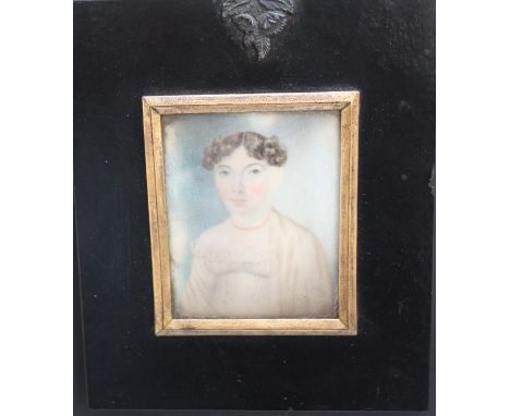 (XIX). Portrait miniature on ivory, study of a young woman, unsigned, framed and glazed, frame with painted black brass finia