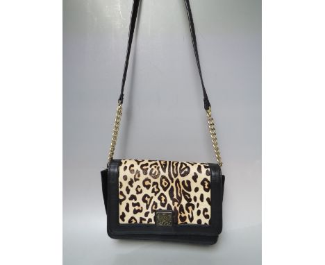 A VINTAGE BIBA BLACK LEATHER / SUEDE AND LEOPARD PRINT CROSS BODY BAG, lining with typical Biba logo pattern, two compartment