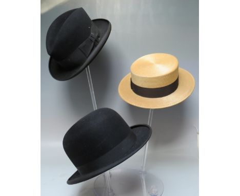 A VINTAGE DUNN &amp; Co BLACK FELT HOMBURG HAT, together with a vintage Furtex Bowler Hat and a Dunn &amp; Co straw boater (3