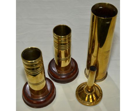 Pair of mounted trench art shell cases, poker stand made from inert ammunition and a 12LB shell casing  