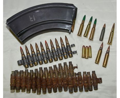 Large selection of various inert ammunition including a link, various calibers, quantity of inert wooden tipped ammunition, a