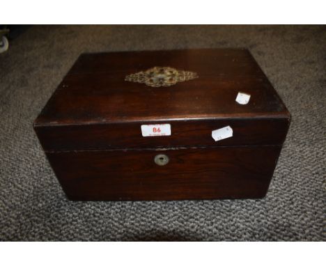 A vintage wooden writers compendium having mahogany case and mother of pearl inlay