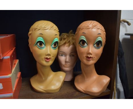 Three vintage mannequin heads including two mid century styled