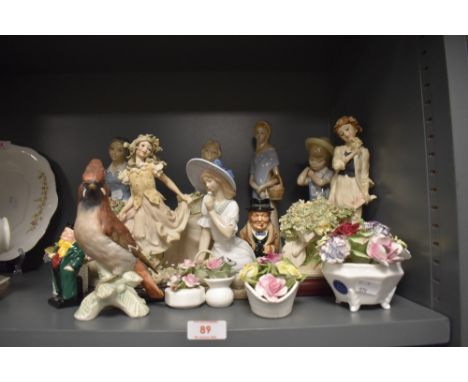 A selection of figures and figurines including Lladro and Goebel
