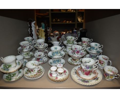 A selection of tea cups and saucers by Royal Albert in various designs