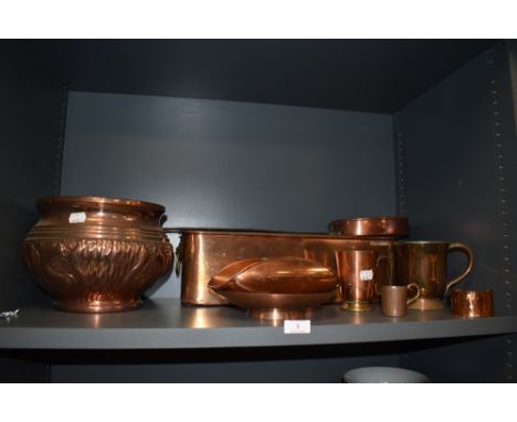 A selection of copper wares including large impressed planter
