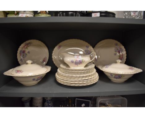 A part dinner service by J and G Meakin in a floral pattern