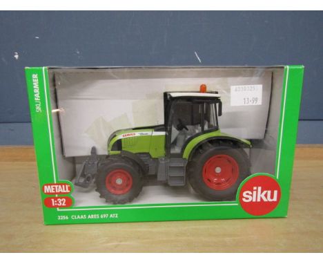 Boxed Siku 1:32 scale die-cast Claas ARES 697 ATZ tractor. Model No 3256