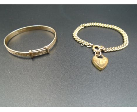 Two child's gold bracelets - Christening bangle marked 9ct metal core 4.34g, other marked rolled gold - 5.96g&nbsp;