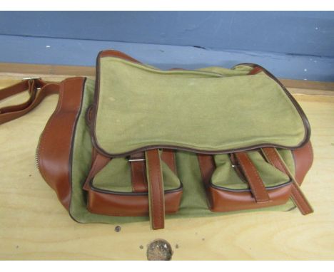 A canvas and leather trim hunting/ game bag with zip for expanding