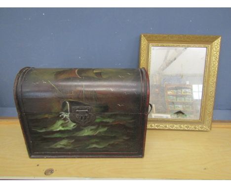 A domed trunk with ship design 50x38cm and a mirror