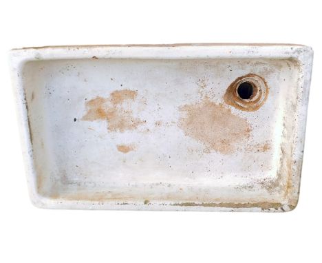 A ceramic Belfast sink, with reeded and moulded corners, 14cm high, 78cm x 47cm. 