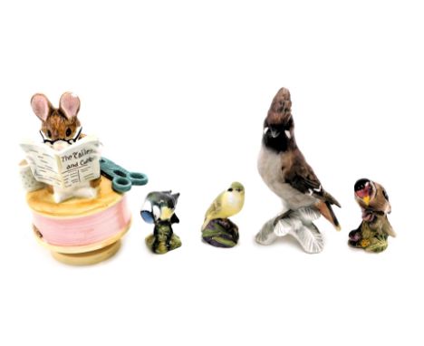 Four bird ornaments, comprising a Goebel European goldfinch, 18cm high, a Royal Worcester wood warbler, 8cm high, each with c