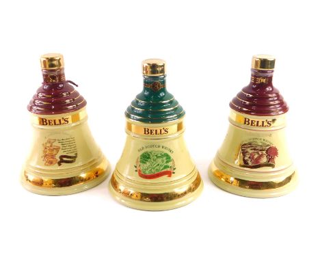 A Bell's extra special old Scotch whisky, made to commemorate Christmas 1998, boxed, and a summer 1997 bottle, and another fo