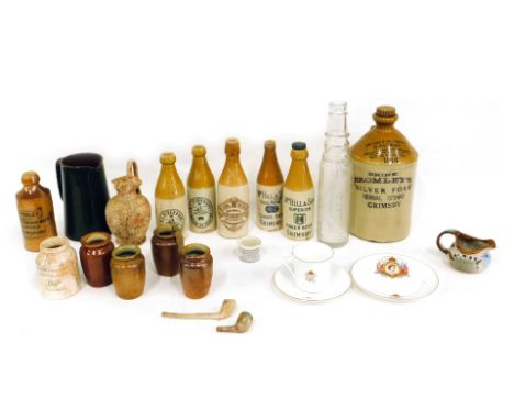 A quantity of stoneware bottles, commemorative cups, saucers, etc.