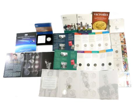 A group of collectors coins, comprising Royal Mint Britannia one ounce silver 2019 uncirculated coin, a Royal Mint Birmingham