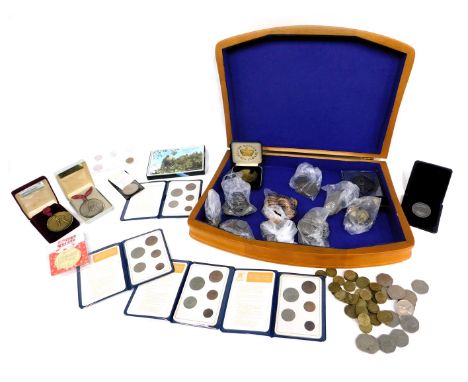 A group of collectors coins, comprising Britain's first decimal coin packs, Sport Relief 2002 medal, a rail building winner m