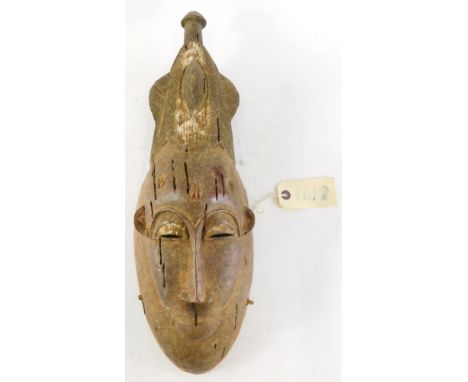 An Old Mblo portrait mask with encrusted patina, Cote D'Ivoire, 50cm high.  (AF)