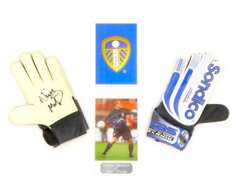A Nigel Martyn framed print, of the Leeds United goal keeper and gloves, bearing signature with a Penco of Peterborough certi