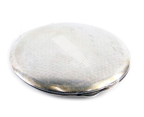 A George V silver compact, of engine turned decoration with vacant cartouche and Art Deco style stepped rectangular design, o