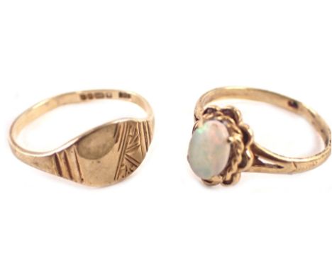 Two 9ct gold dress rings, comprising an opal single stone dress ring with petalated border, ring size J½, a 9ct gold signet r