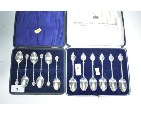 Two cased silver teaspoon sets, one for the Coronation of Edward VIII, by JW Co, London 1936; and another set with a bird fee