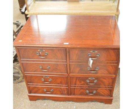 A 20th Century mahogany filing cabinet, with rectangular top, above a bank of four short drawers with dummy fronts, raised on