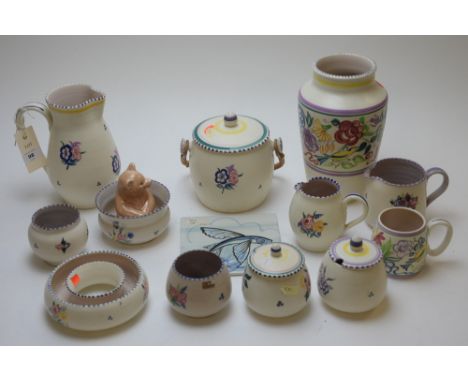 Poole pottery 'Traditional Ware KW Pattern', to include: vase; jugs; ashtray; biscuit barrel and cover; sugar bowls; and othe