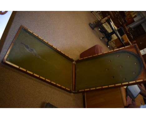 A 19th Century bagatelle board, with green baize lined playing surface contained within a mahogany case, 257 x 76cms.