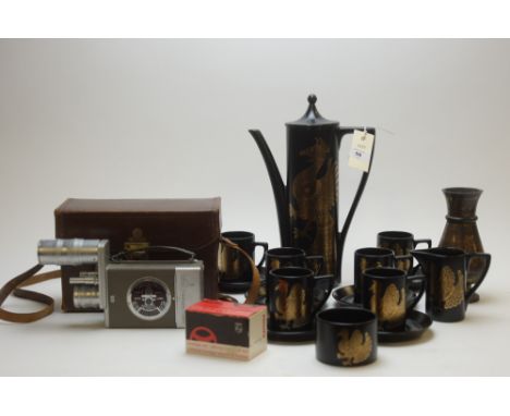 A Portmeirion Phoenix coffee set by John Cuffley, for six people; together with a Bell &amp; Howell 16mm cine camera with box