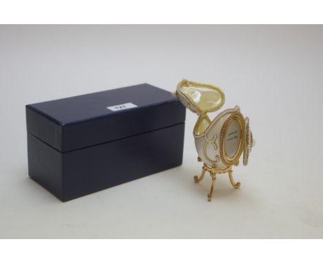 A Faberge-style goose egg decorative photograph frame and trinket box on gilt stand, with box.